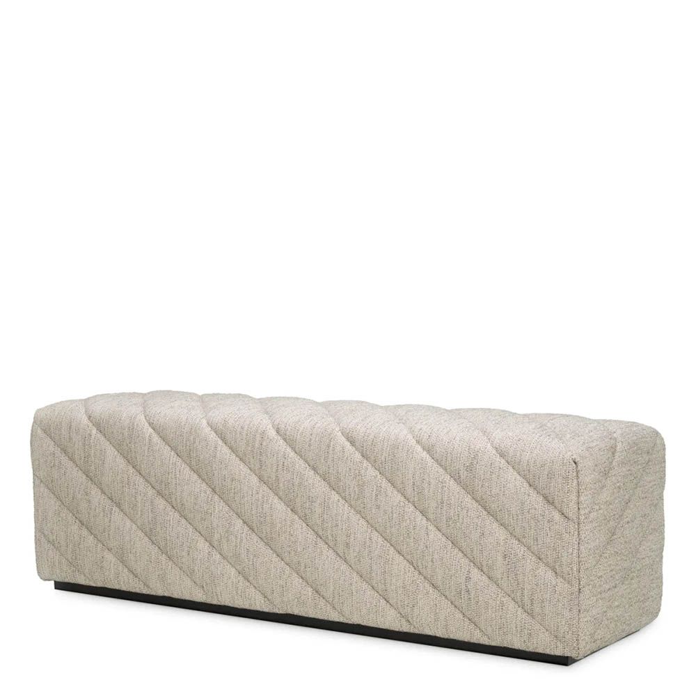 Grey upholstered modern sofa with chevron stitching detail