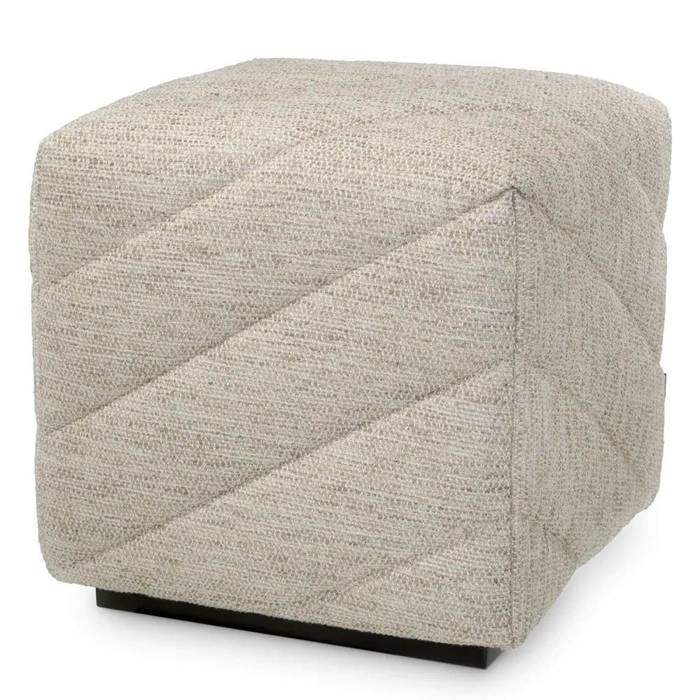 Grey upholstered square stool with chevron stitching detail 