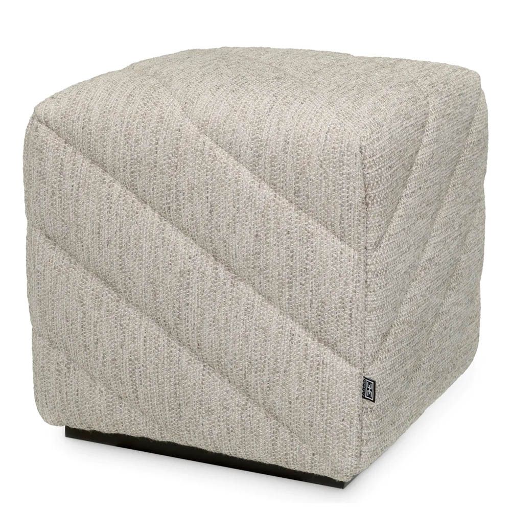 Grey upholstered square stool with chevron stitching detail 