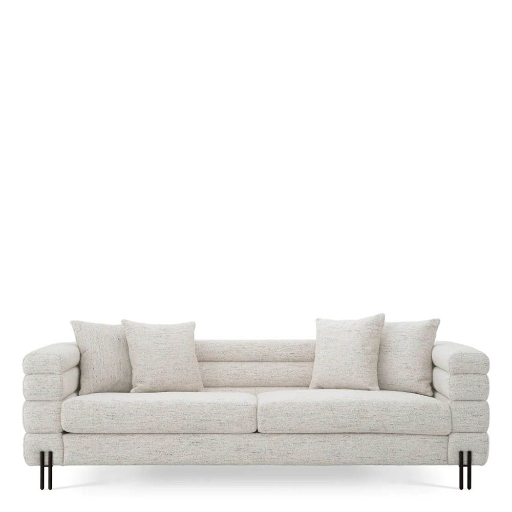 Off-white upholstered sofa with horizontal fluting