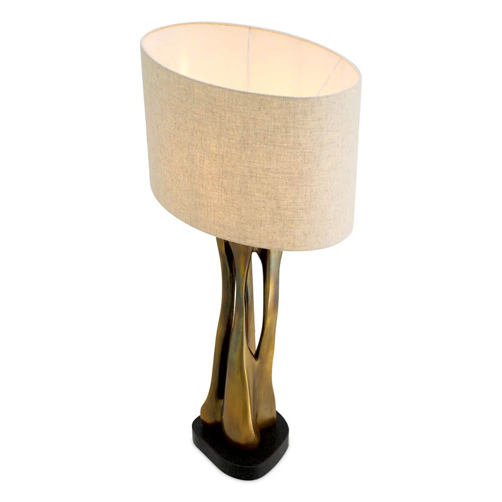 Table lamp with vintage brass finish base and linen shade