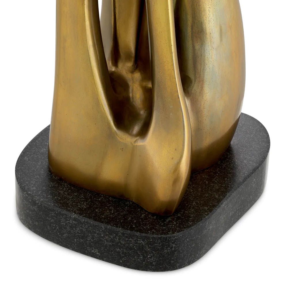 Table lamp with vintage brass finish base and linen shade
