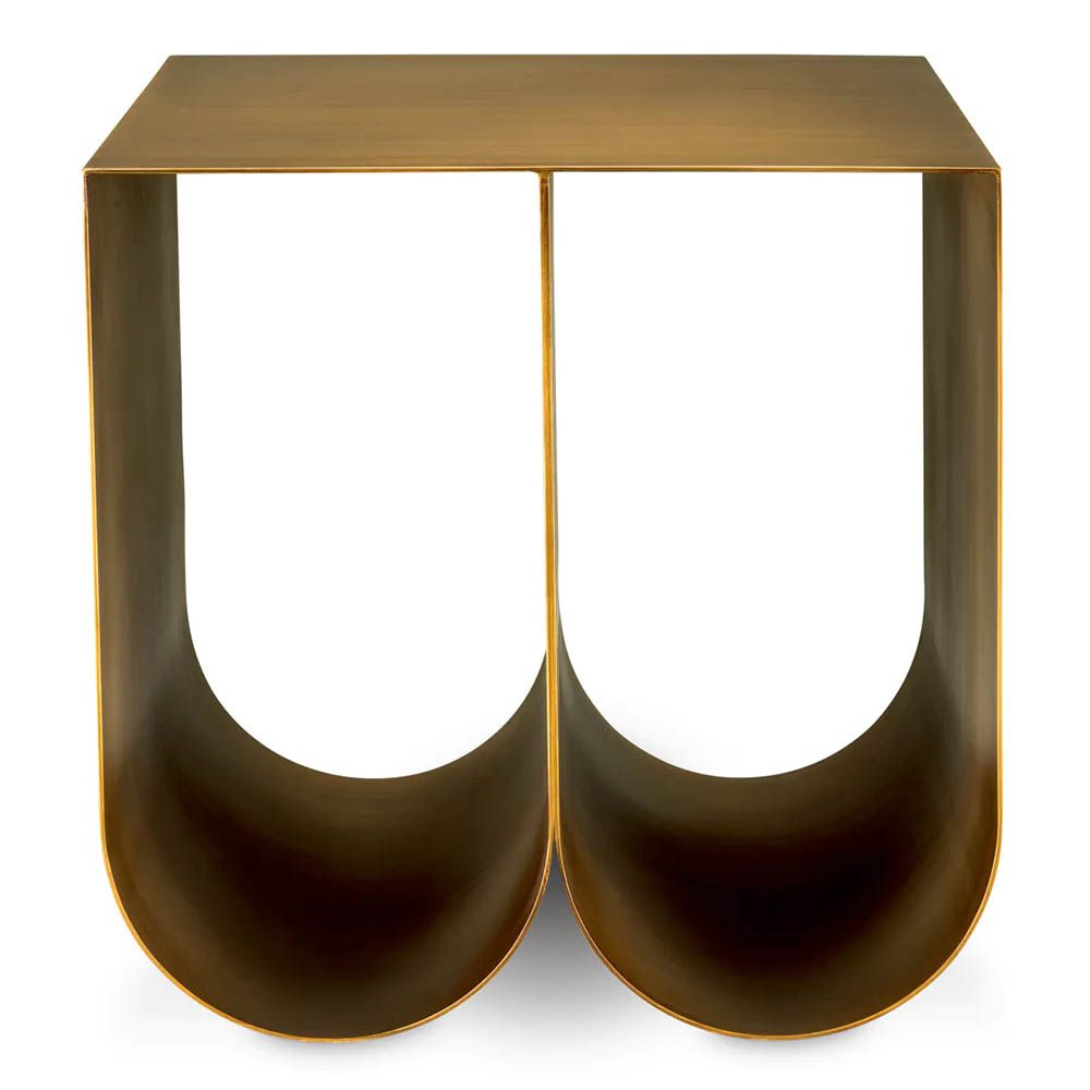 Modern side table with two curved legs finished in brushed brass