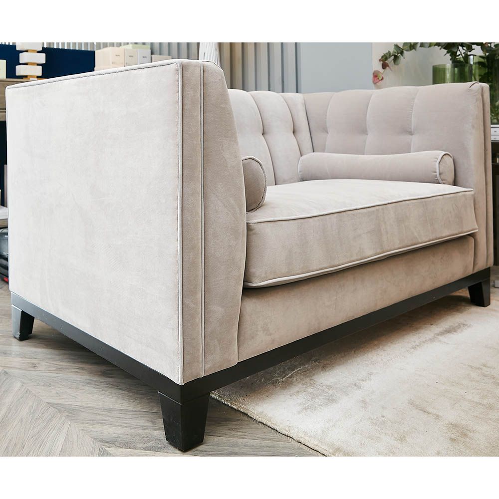 ex-display armchair in grey upholstery with fluting and deep stitching details