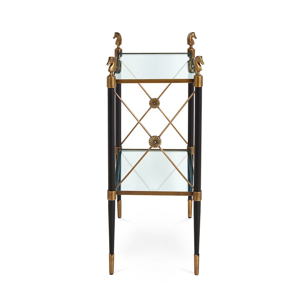 A regal brass and black French Empire-inspired side table with glass shelves