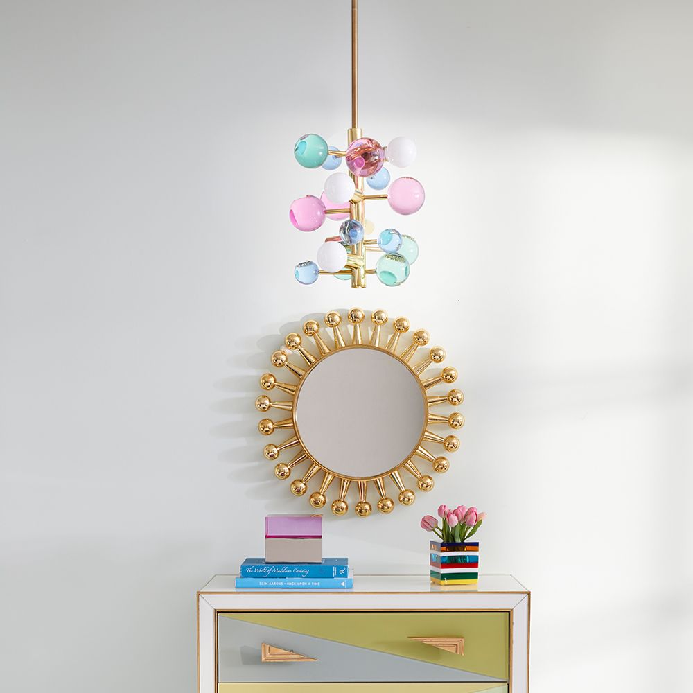 A glamorous 5-light chandelier with jewel-toned globe ornaments