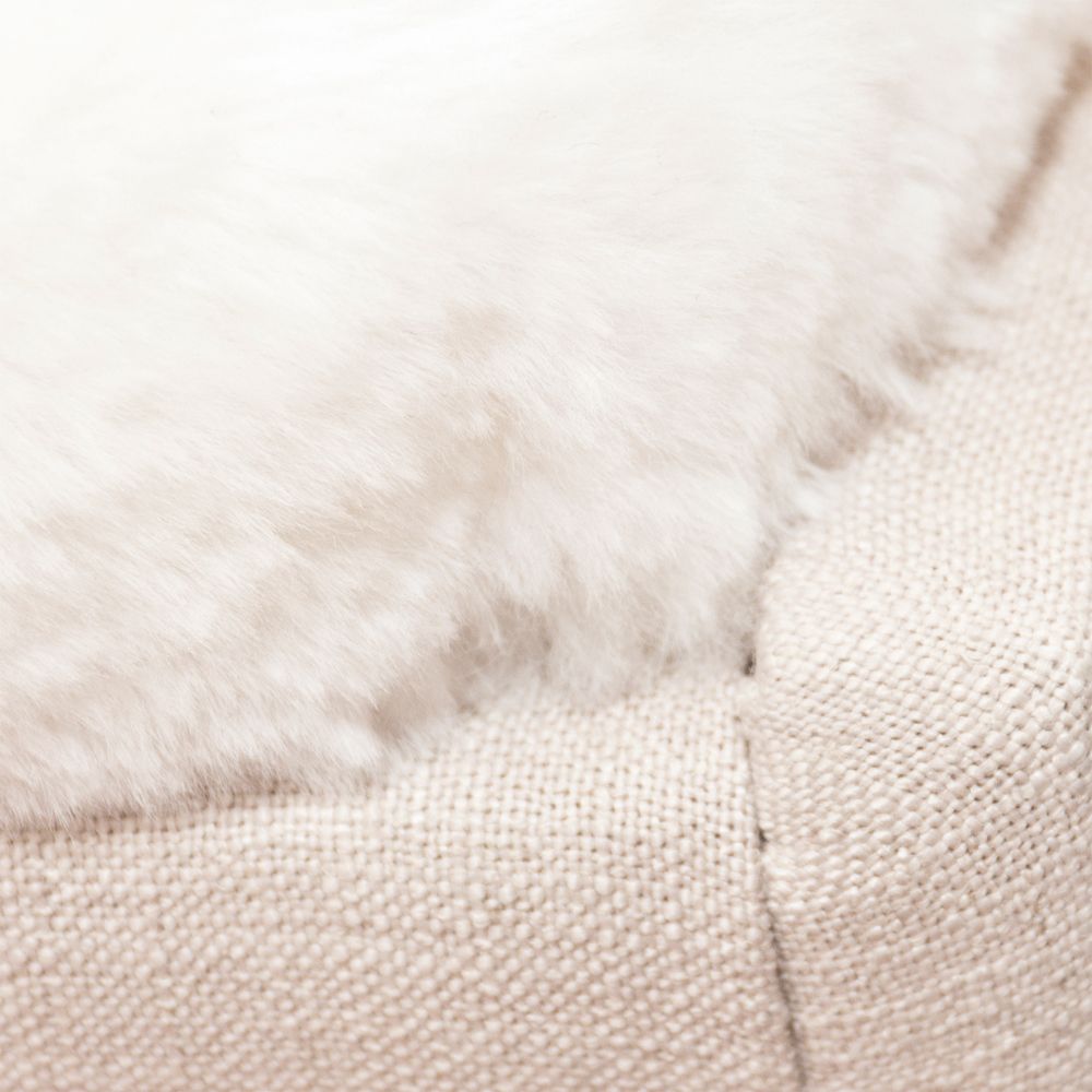 chic, Scandinavian-inspired armchair with a shearling-lined seat