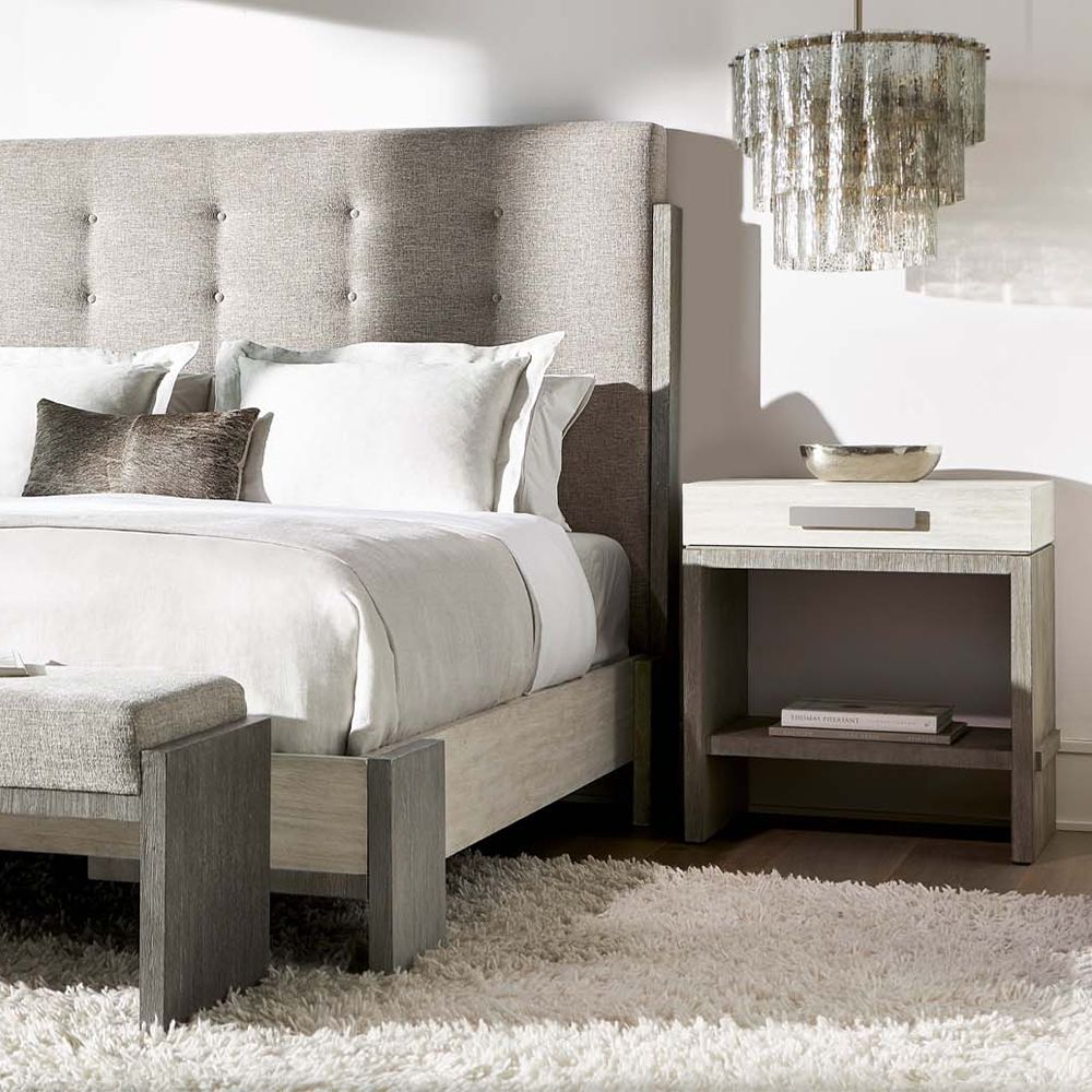 A gorgeous bedside table from Bernhardt featuring a two tone finish, soft closing drawer box, base shelf and dual port