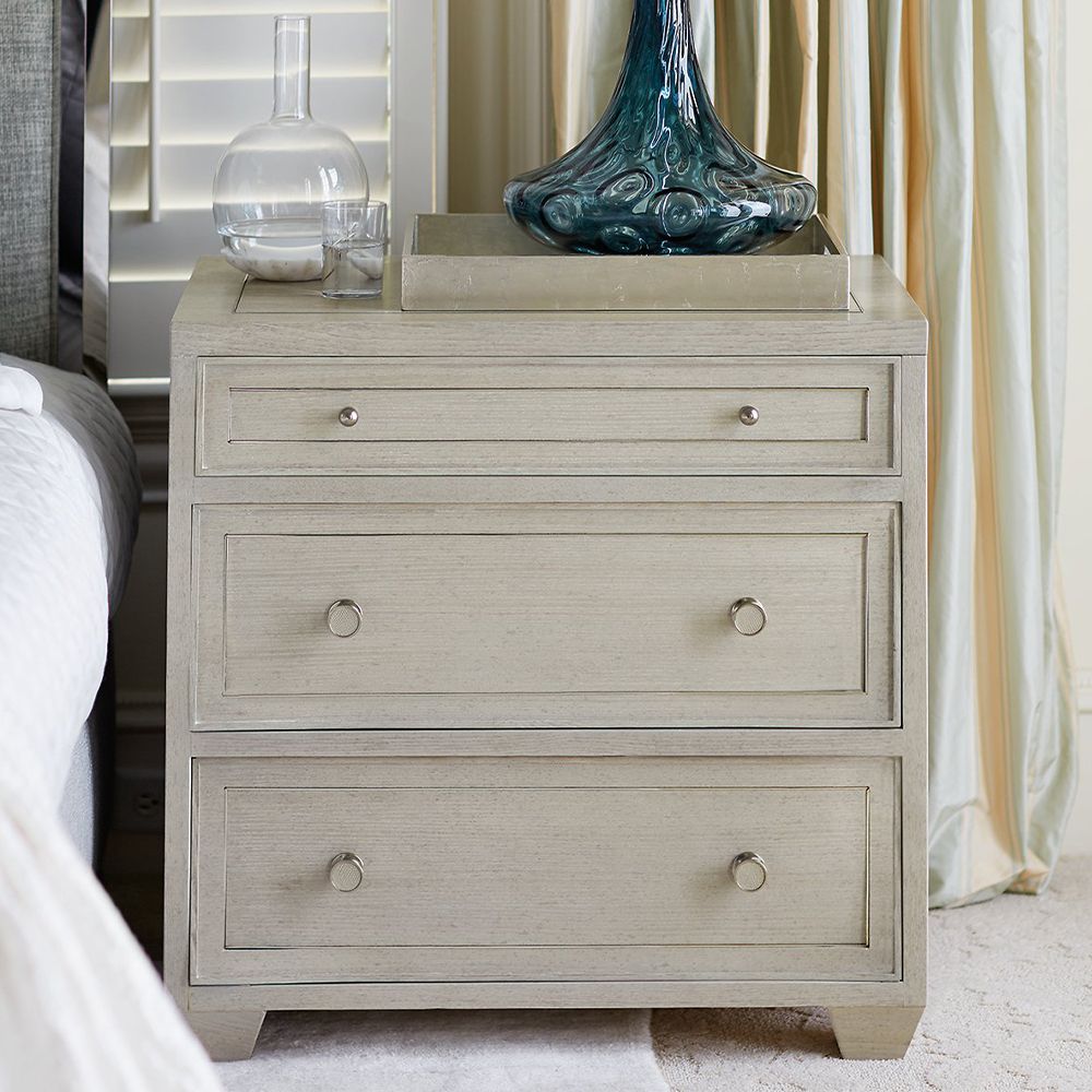 A beautiful, 3 drawer bedside table by Bernhardt.