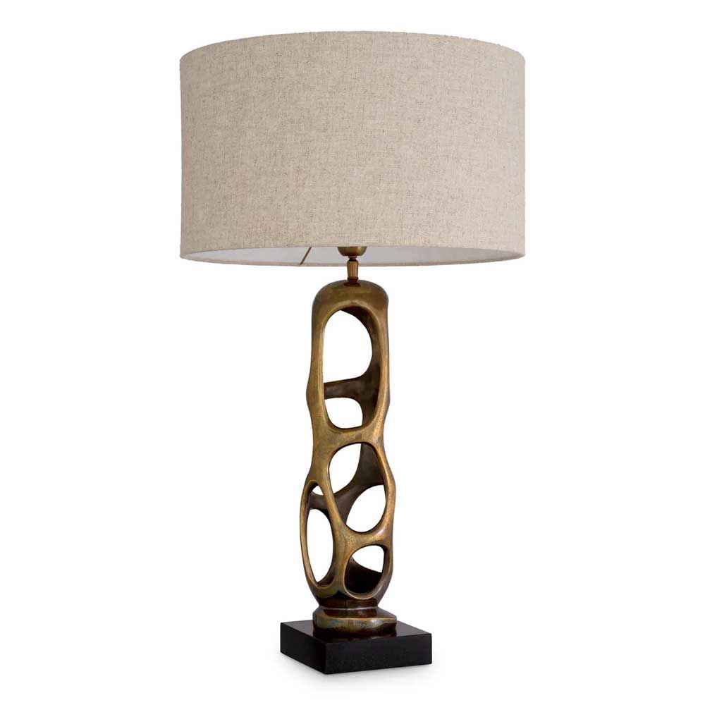 Brass structure table lamp with hole details and linen shade