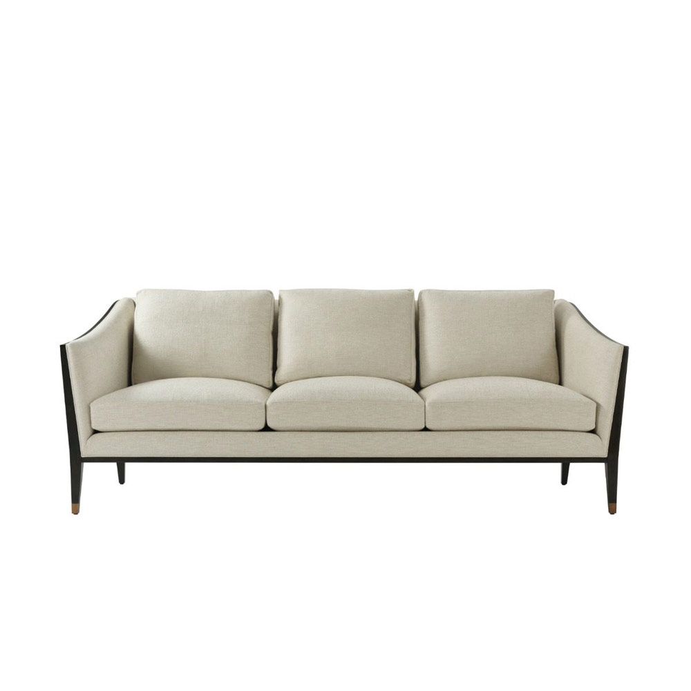 Sleek and sumptuous three seter sofa with dark outline