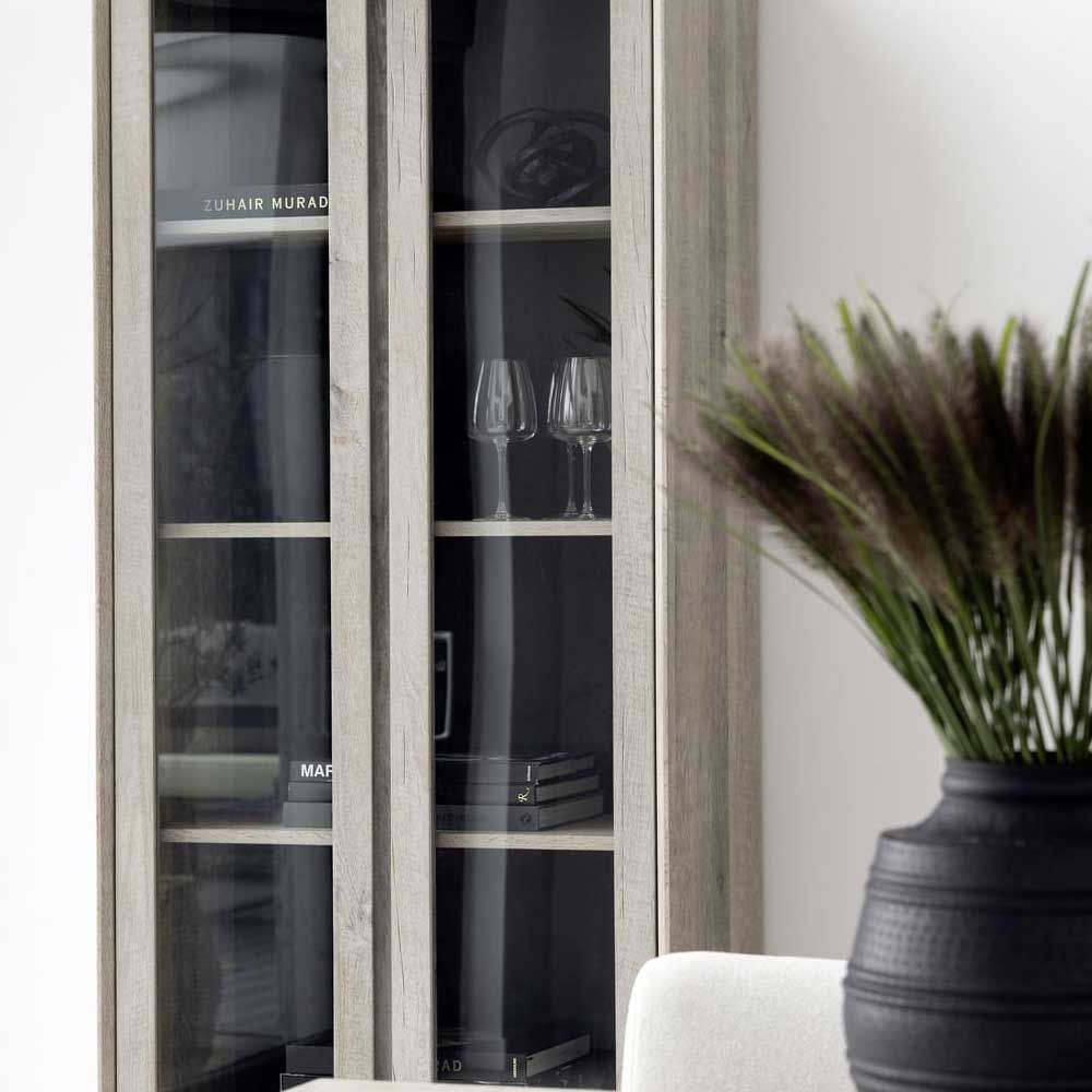 Stylish cabinet with four shelves and glass fronted doors