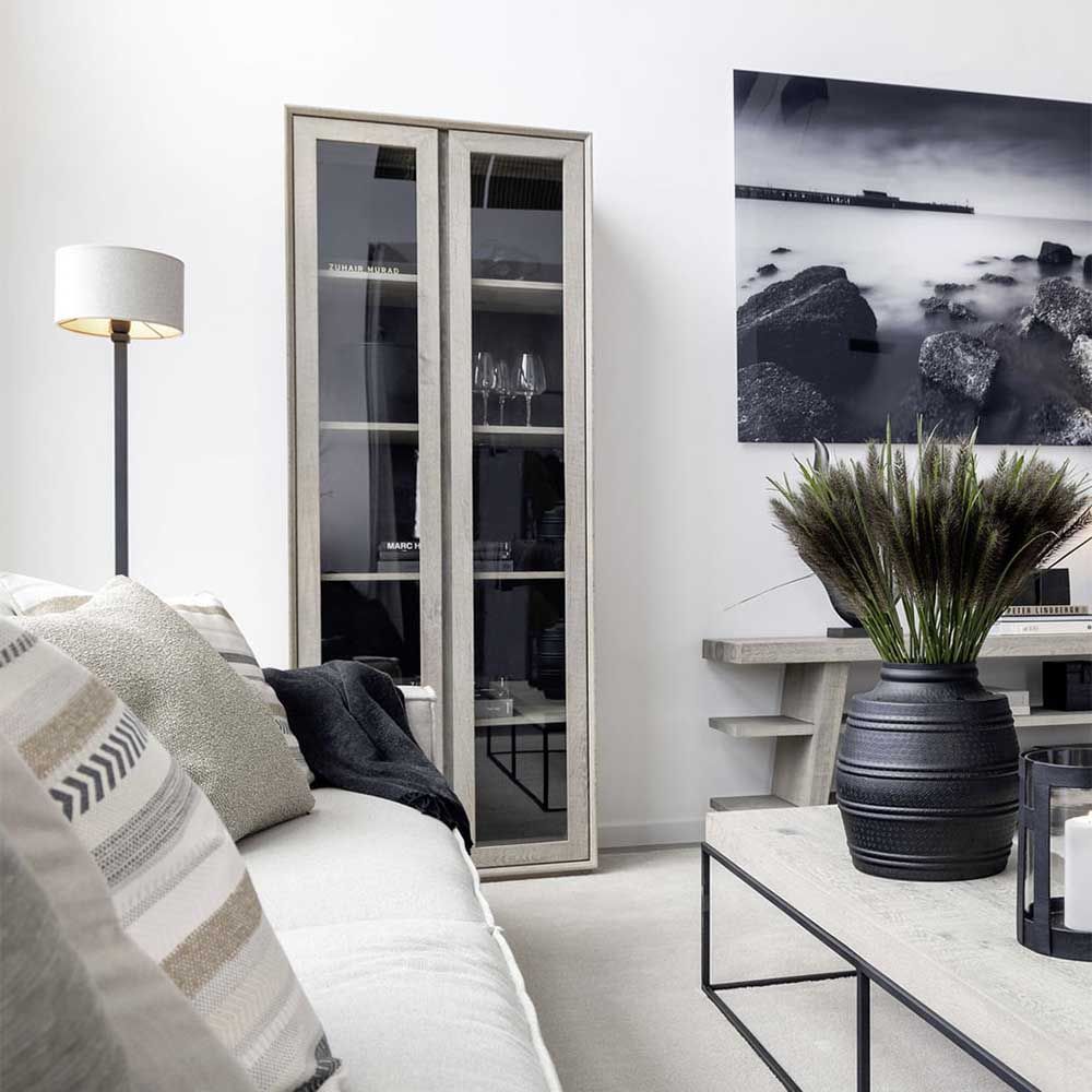 Stylish cabinet with four shelves and glass fronted doors