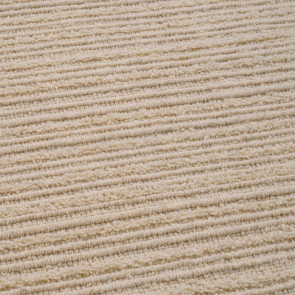 Elegant, neutral rug with gentle ribbed texture