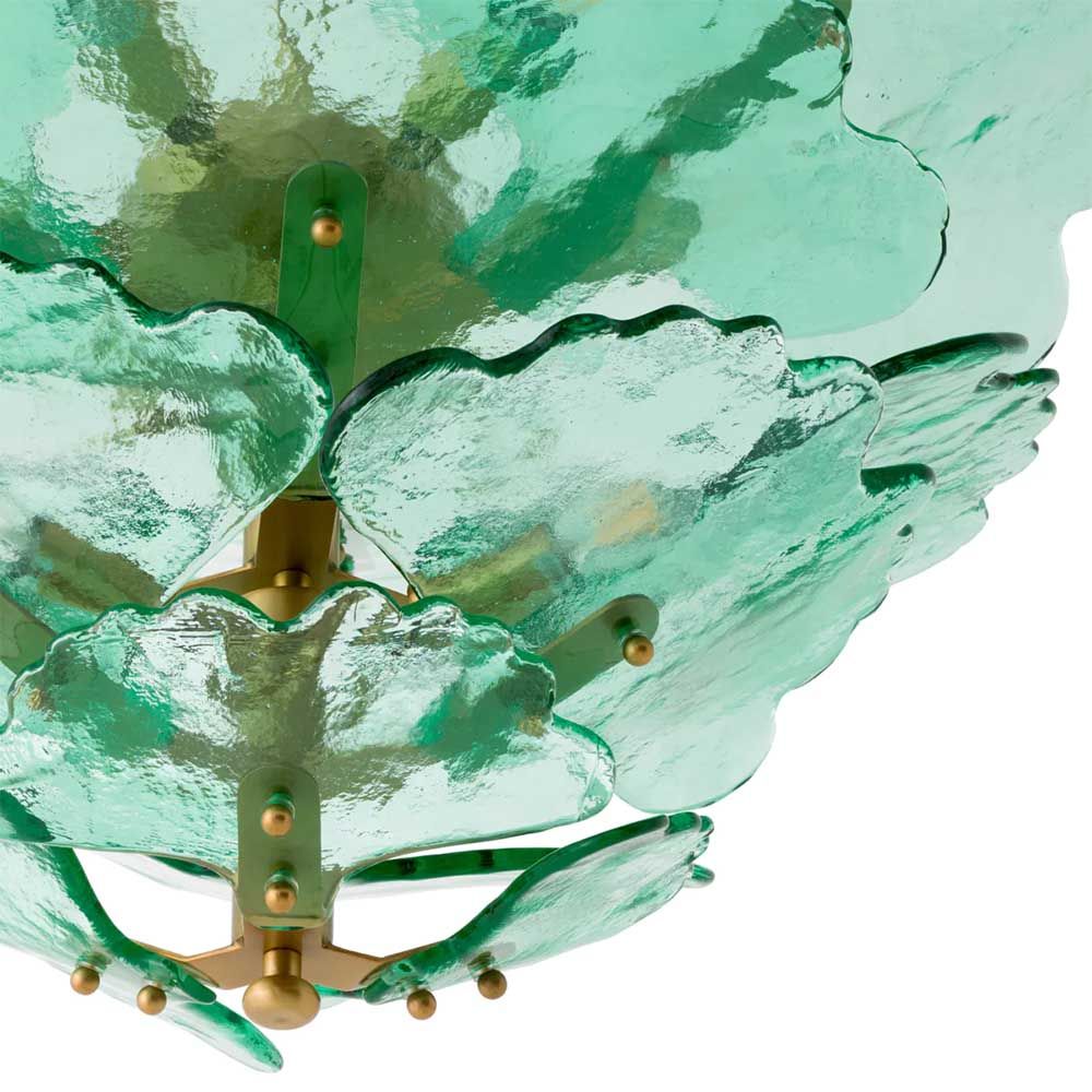 Green glass floral style chandelier with brass ceiling fixture
