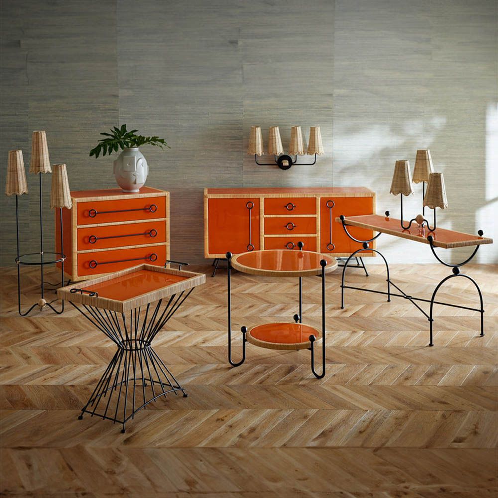 Red and orange chest of three drawers with rattan edges