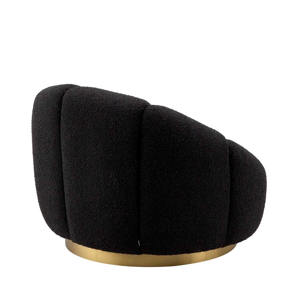 elegant black boucle upholstered swivel chair with brass base 