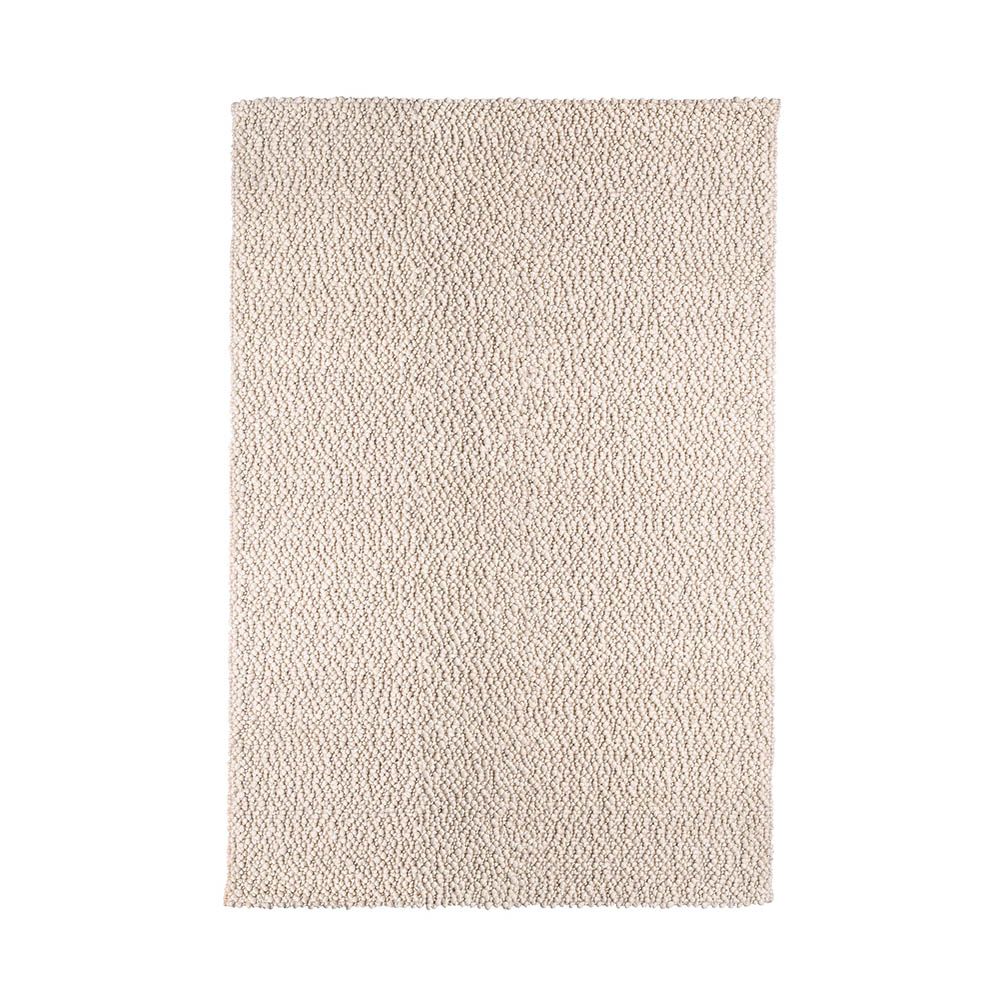 A gorgeous, bobbled texture, wool rug in a beige finish 