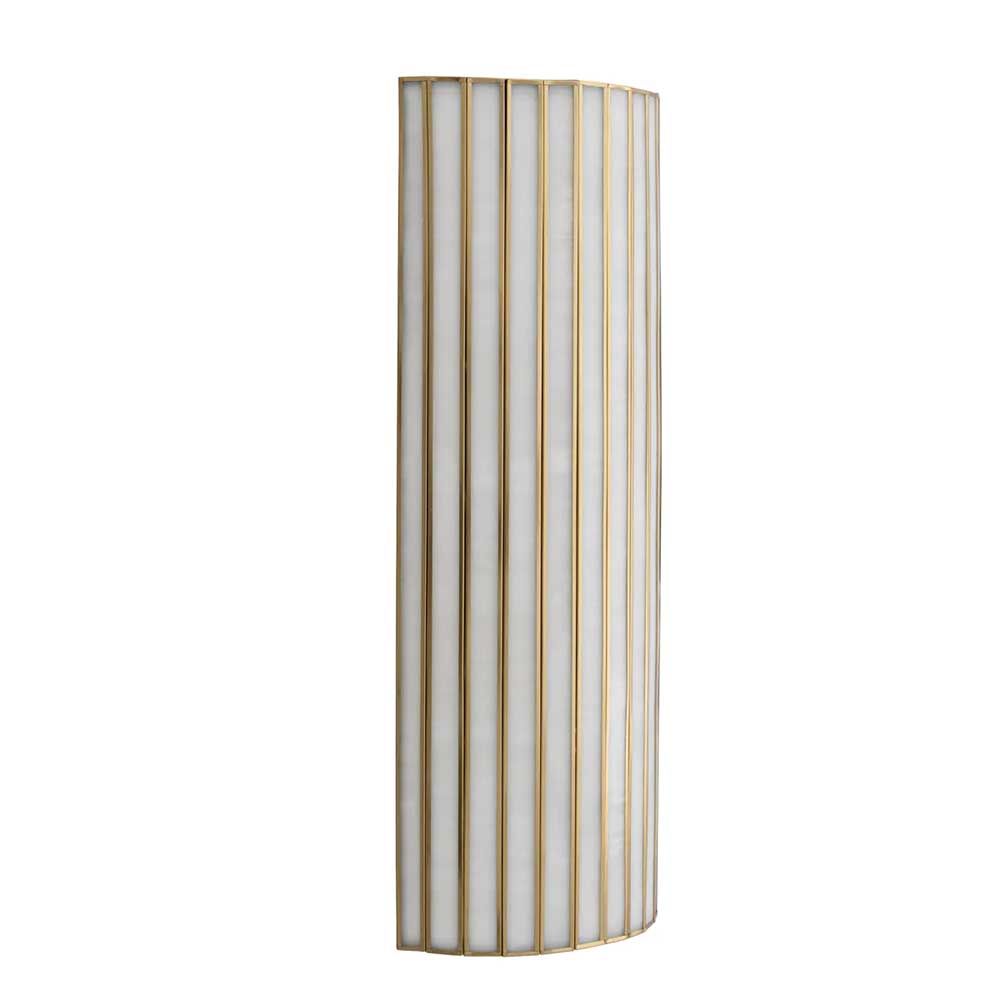 Brass ribbed wall light with gentle radiant glow