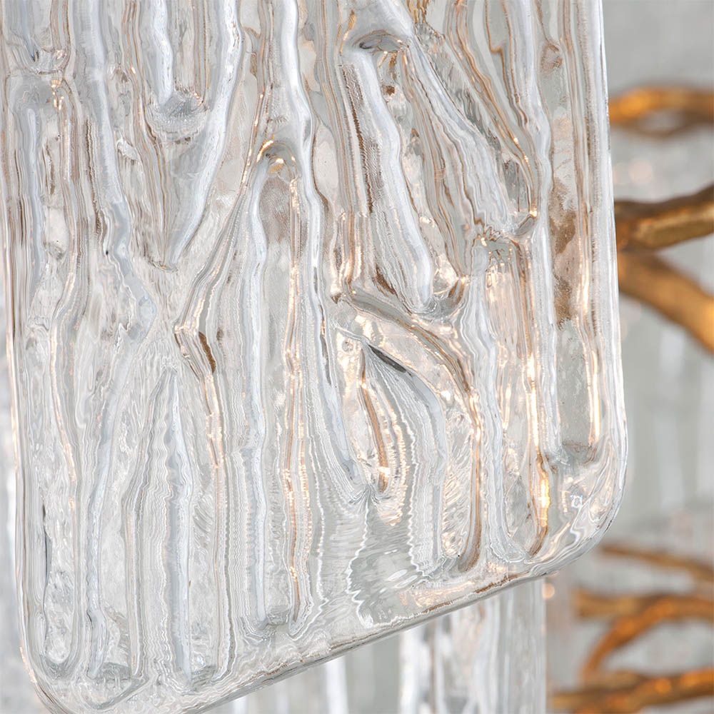 Stylish glass wall sconce with art deco undertones