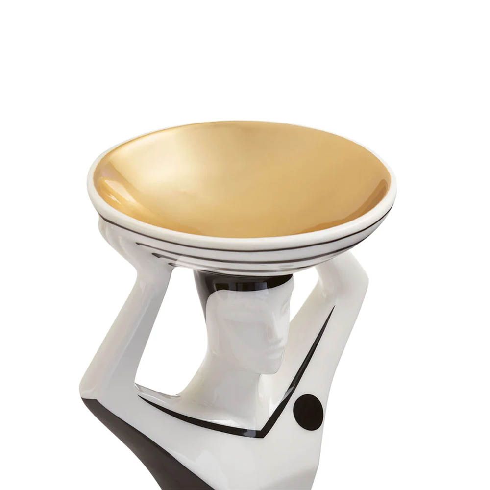 Black and white porcelain Budapest figure carrying gold-lined bowl