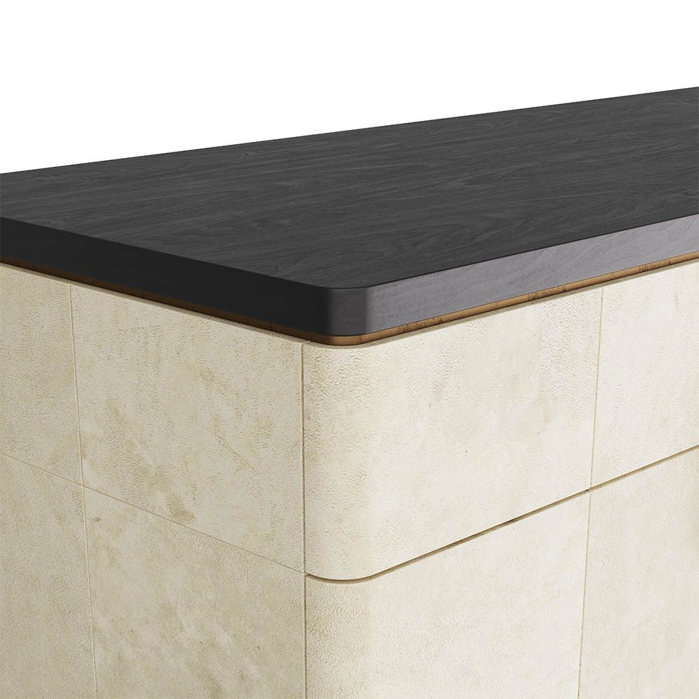 Art deco-inspired credenza wrapped in ivory panelling framed by solid ebony oak