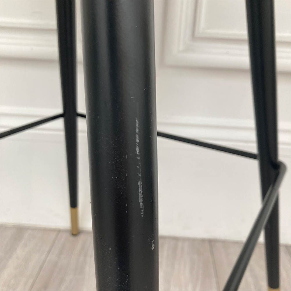 Stylish bar stool upholstered in greige velvet with metal tapered legs 