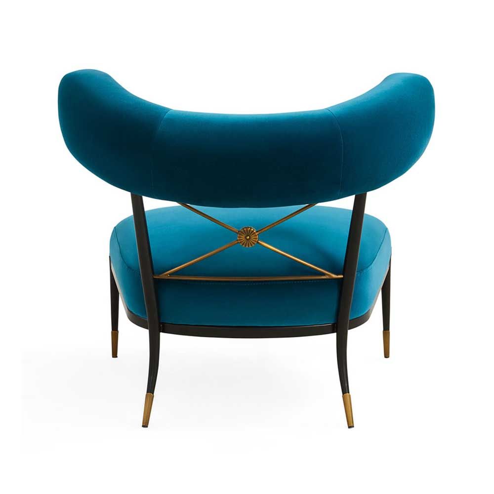 Blue velvet laid back lounge chair with brass accents