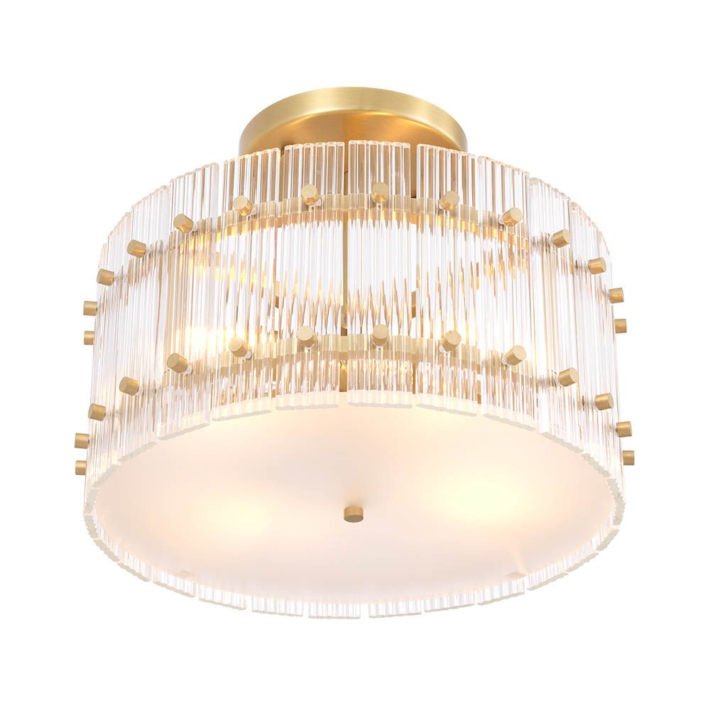 glamorous ceiling lamp in antique brass and encircled by ribbed clear glass
