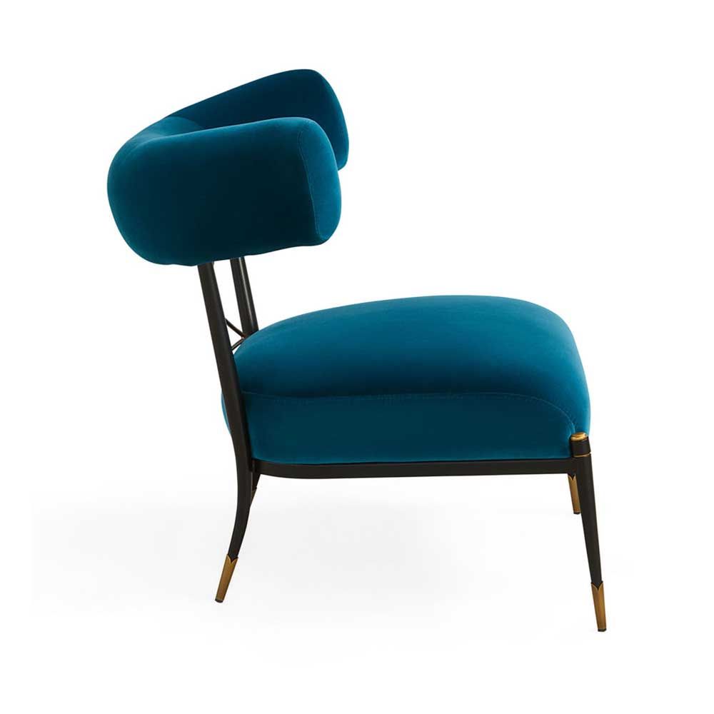 Blue velvet laid back lounge chair with brass accents