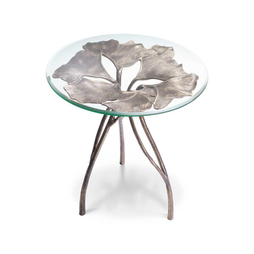 glass top side table with leaf silhouette