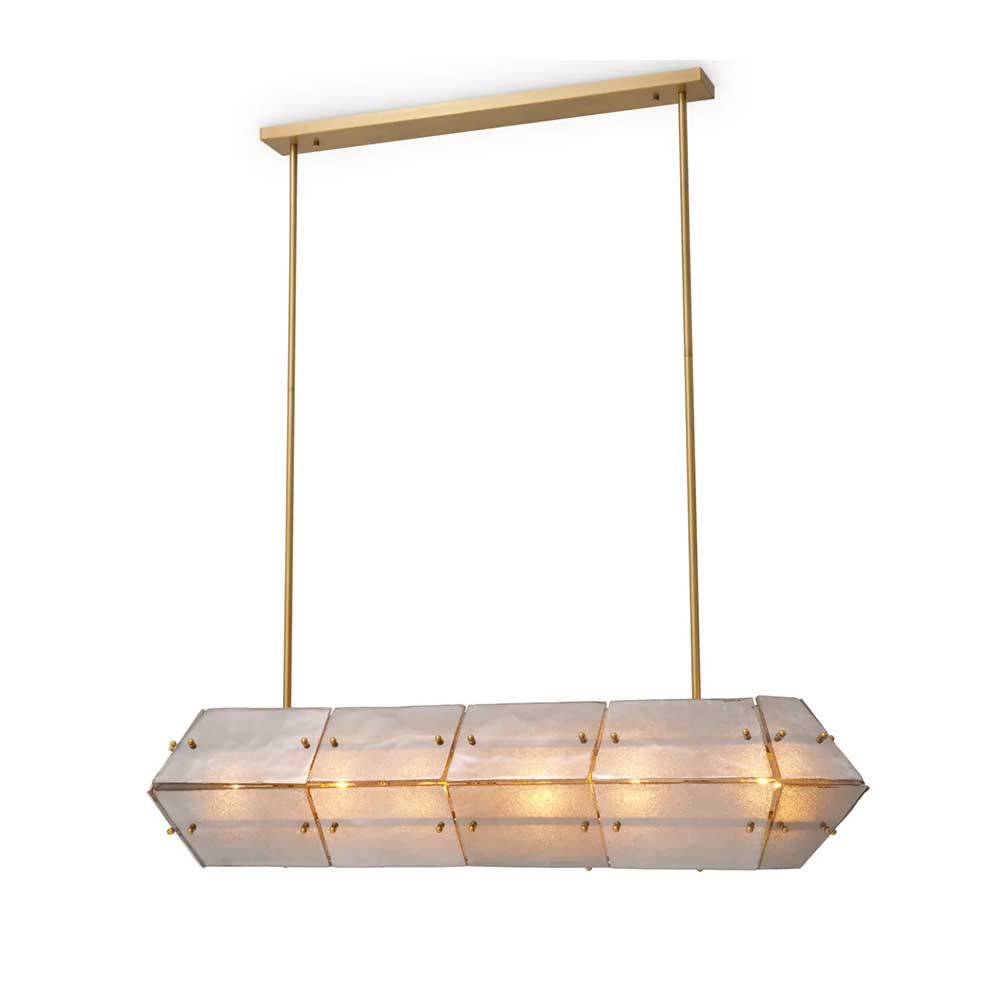 Handmade glass panels with an antique brass finish cast a warm, ambient glow.