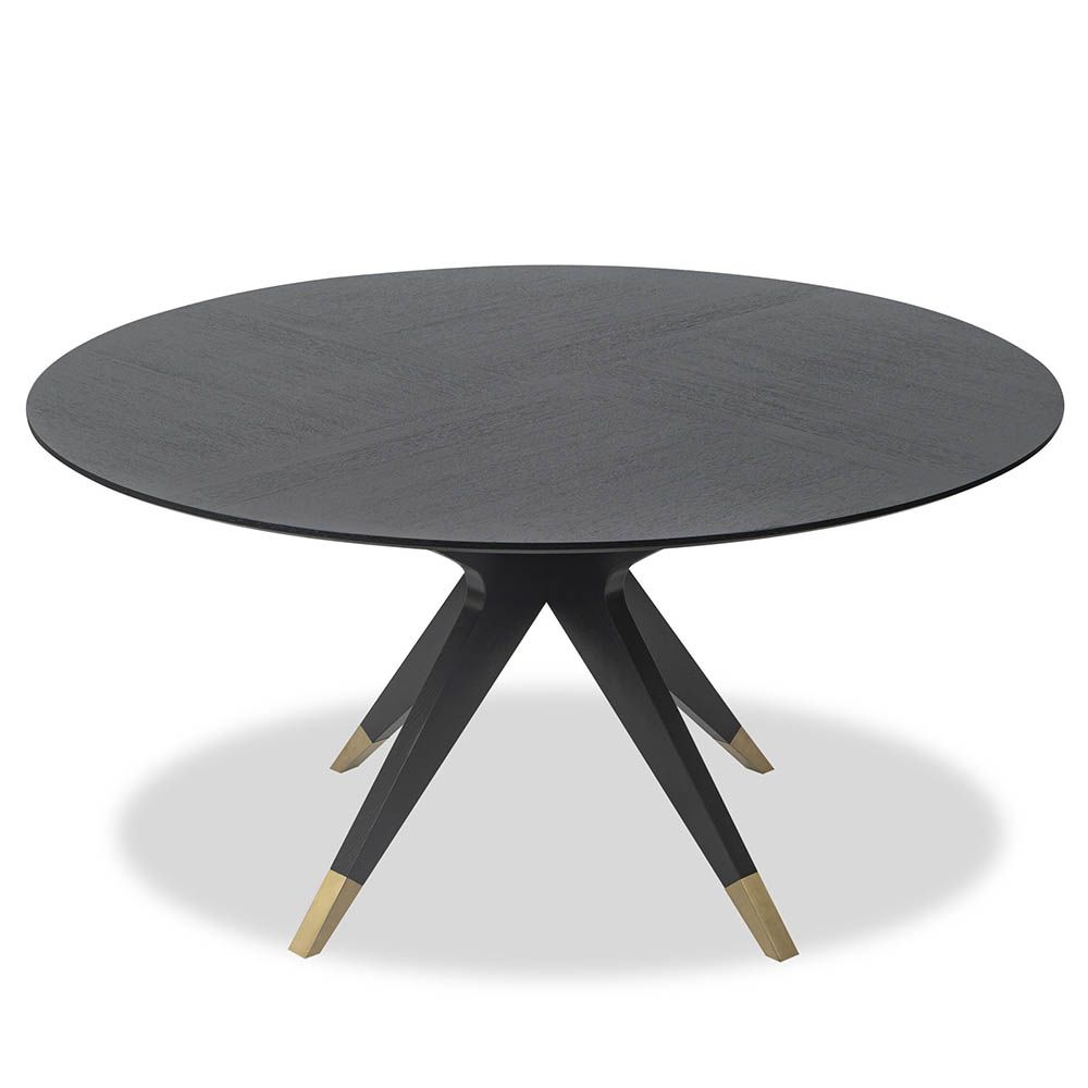 Dining table with statement base of slender spokes and brass caps