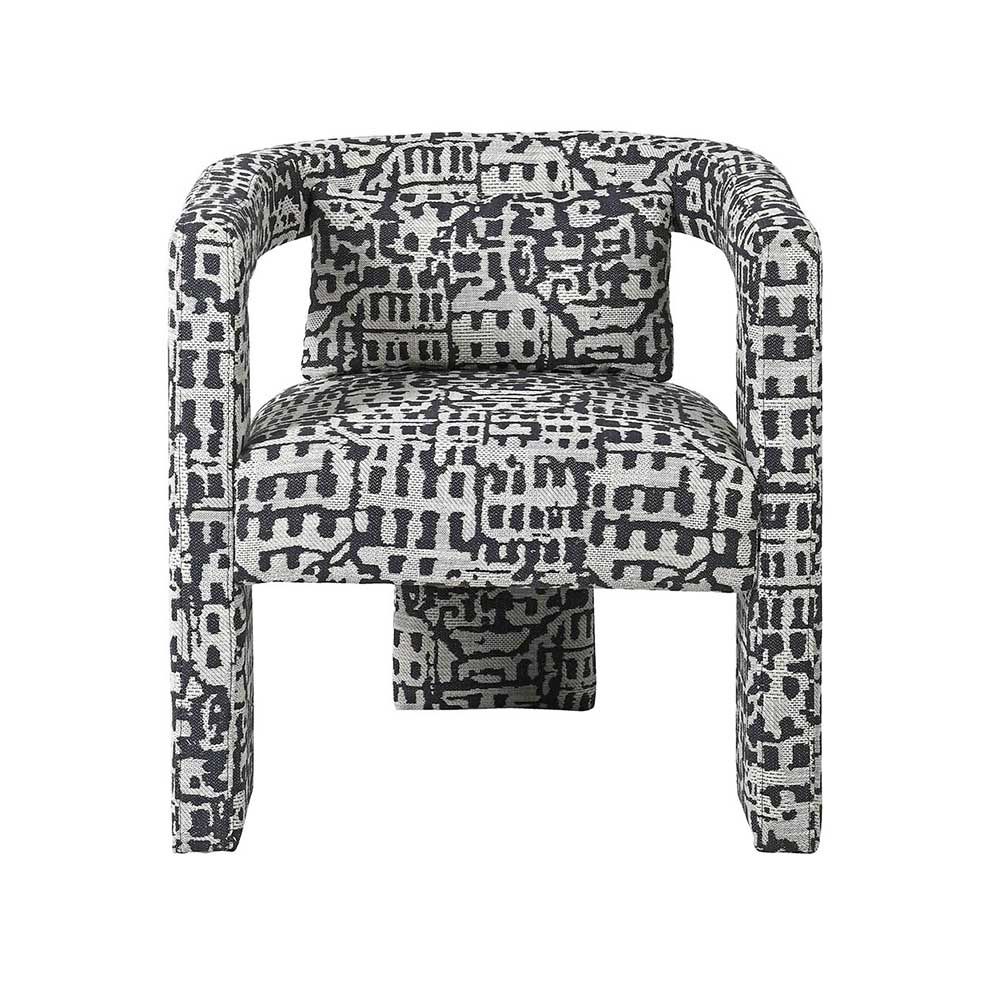 Geometric patterned upholstered armchair with three sleek legs
