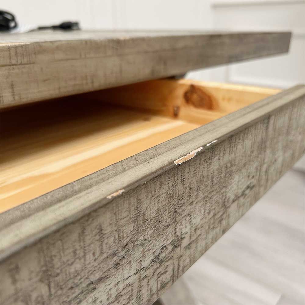 Sophisticated wooden desk with frieze drawer and crossed legs