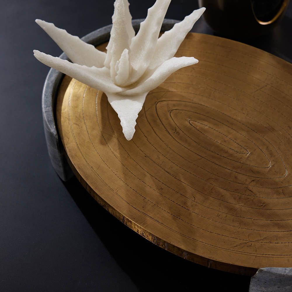 Brass finish oval tray with bronze feet on either side