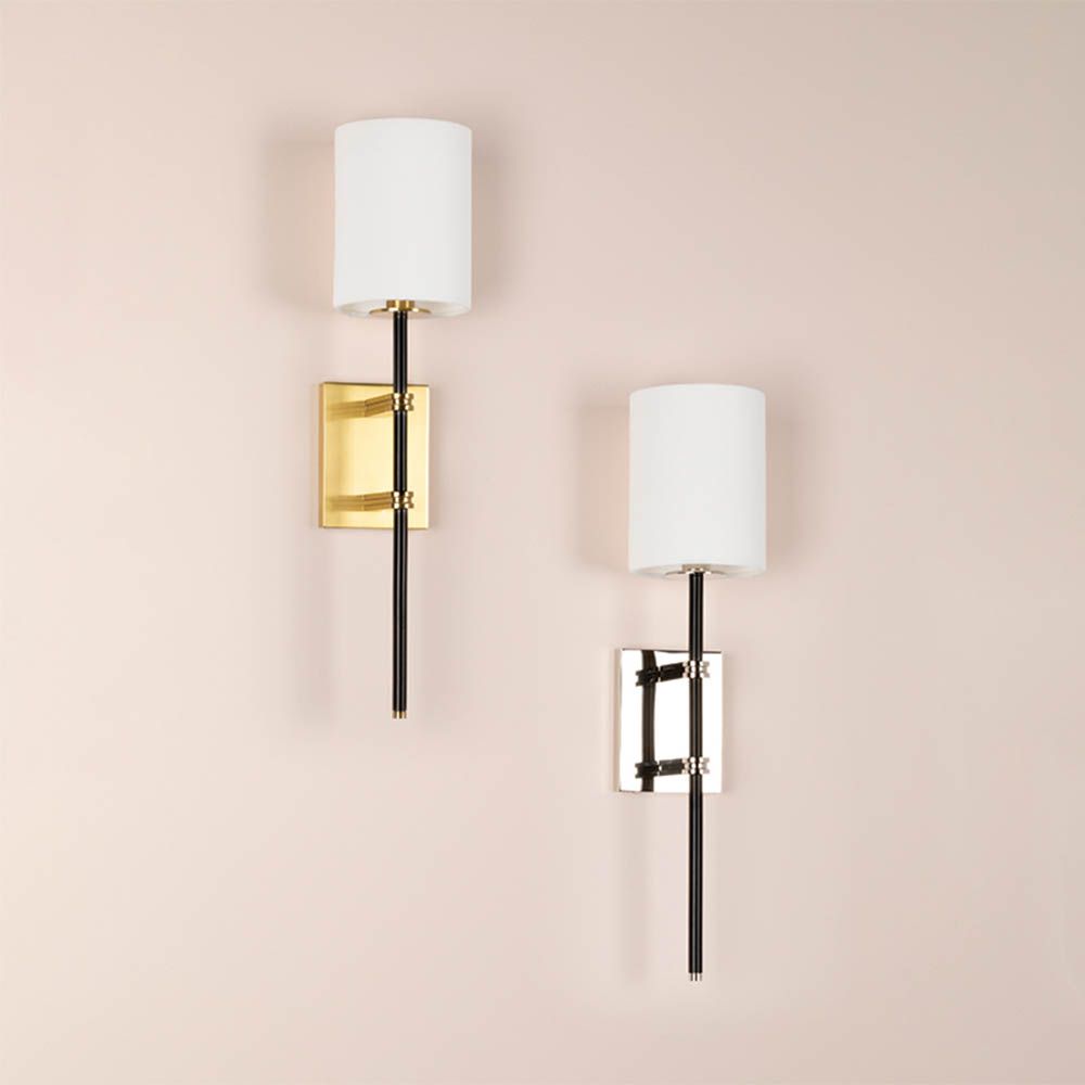 Nickel based wall light with bold black accents