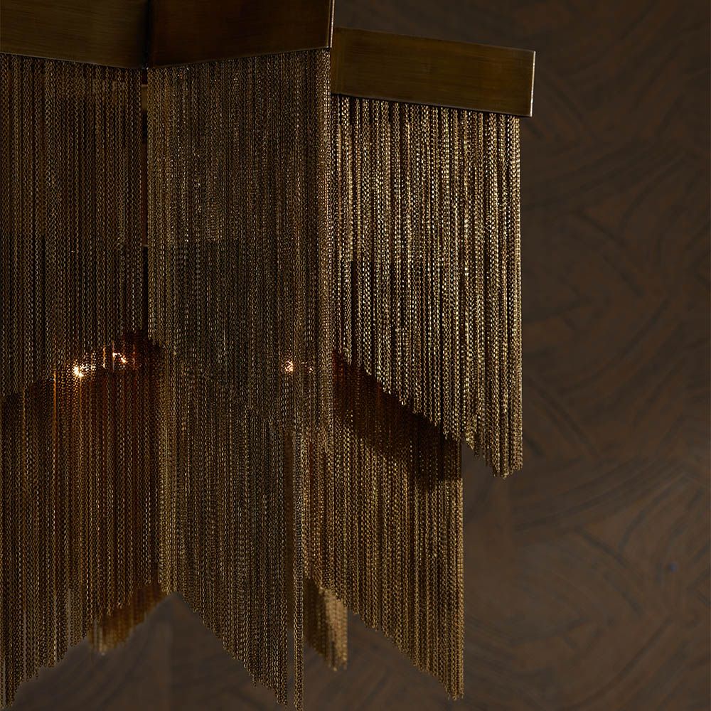 Glamorous star-shaped chandelier with gold chain tassel design
