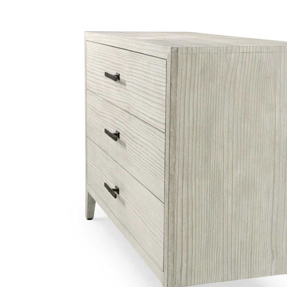 Three drawer whitewood bedside table with brown metal handles