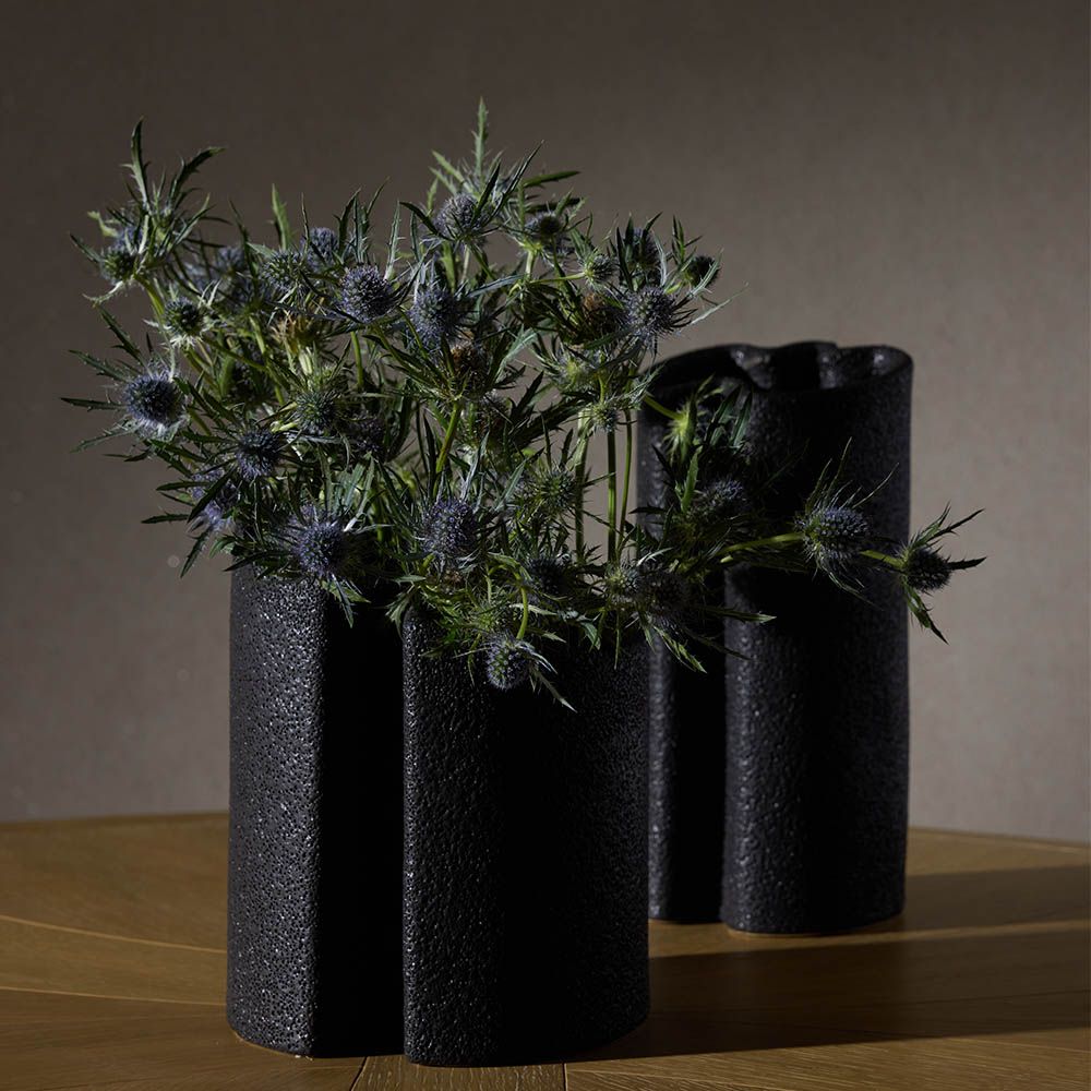 Black textured vases with wavey top