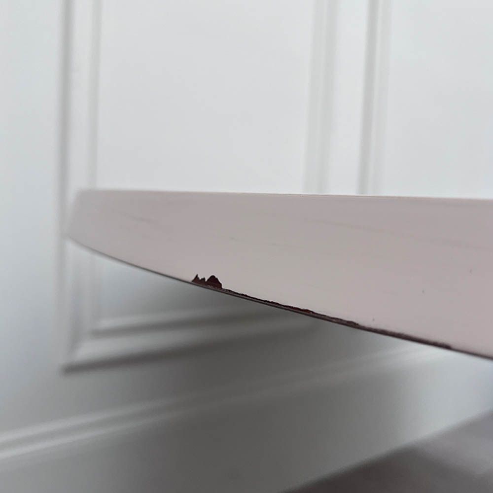 Round and decorative dining table with sculptural base