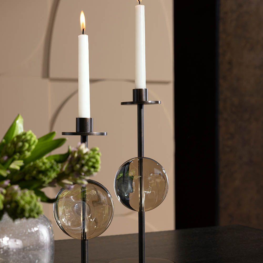 Metal candle holders with round smoked glass element