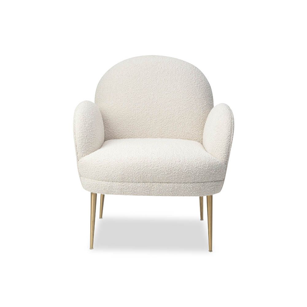 Artisan curved armchair finished in boucle sand with brass legs