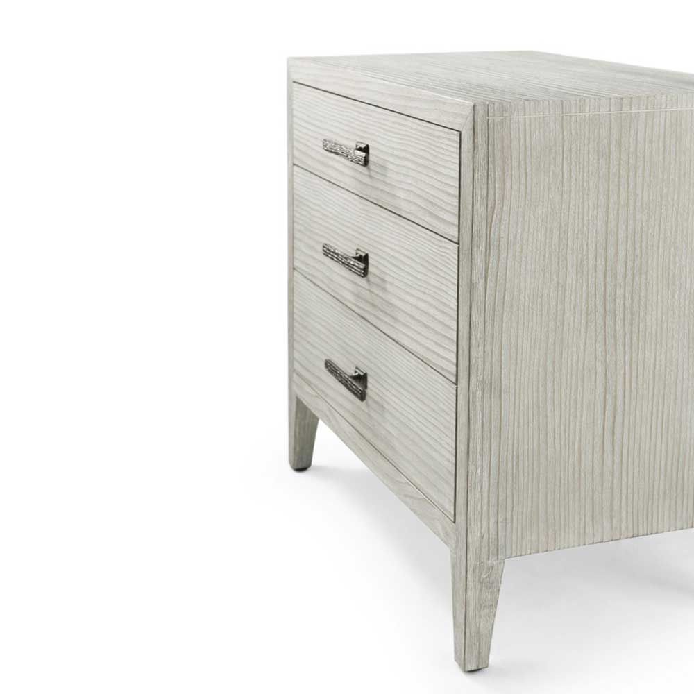 White washed three door bedside table with metal handles