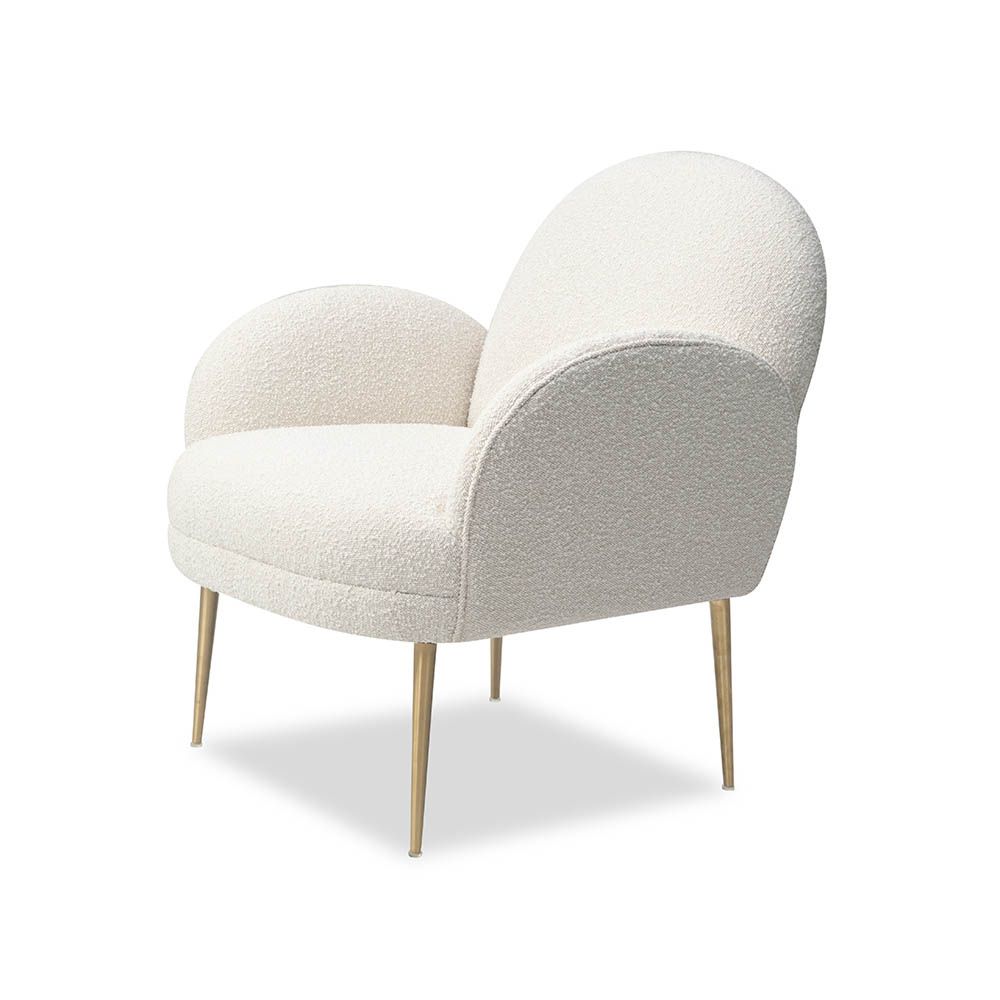 Artisan curved armchair finished in boucle sand with brass legs