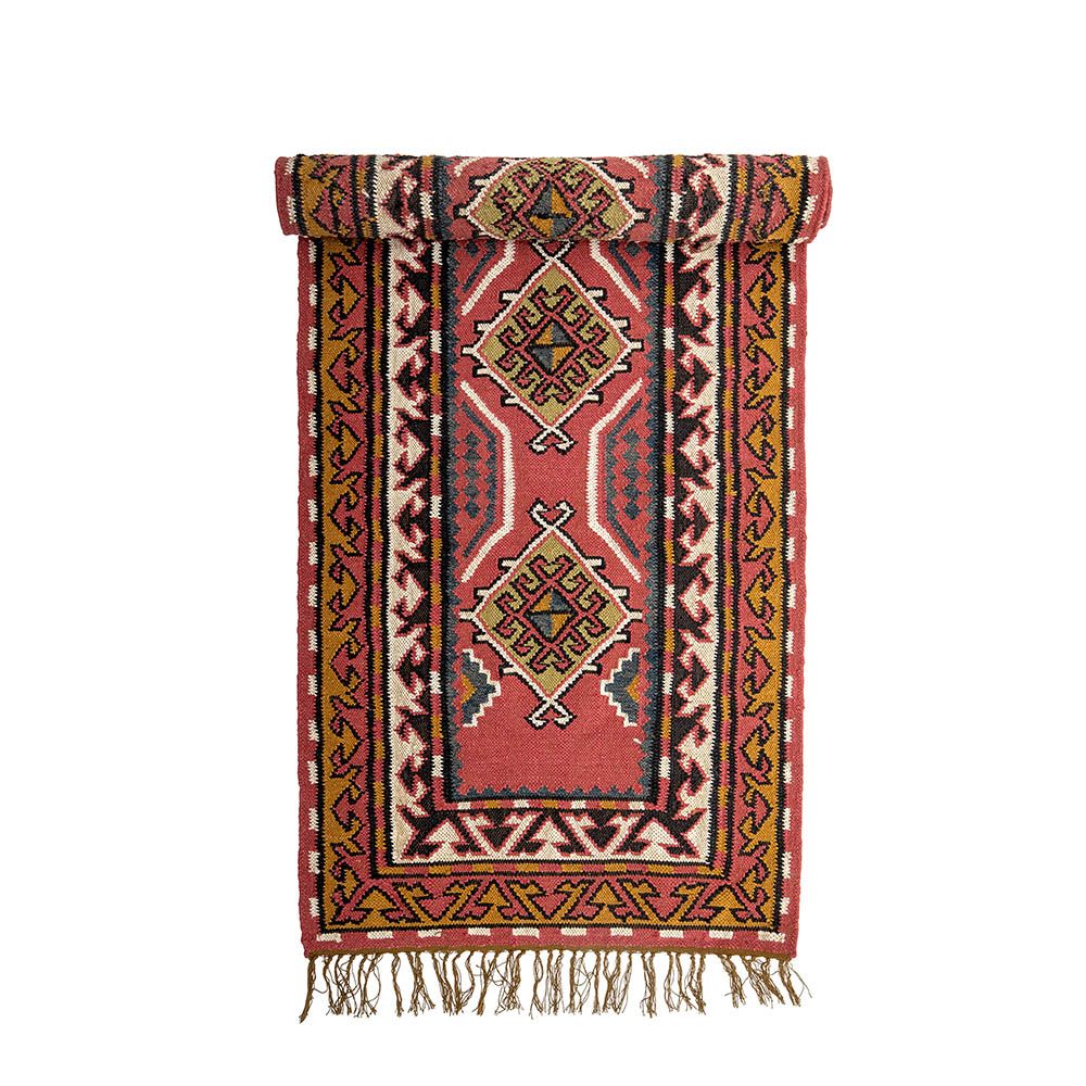 Multicoloured rug with fringe detailing