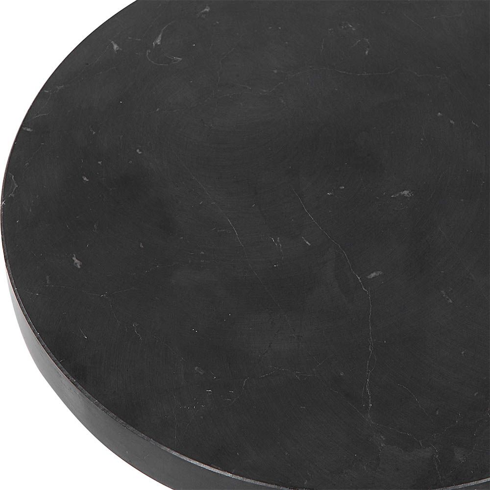 Circular black marble side table with delicate bead detailing