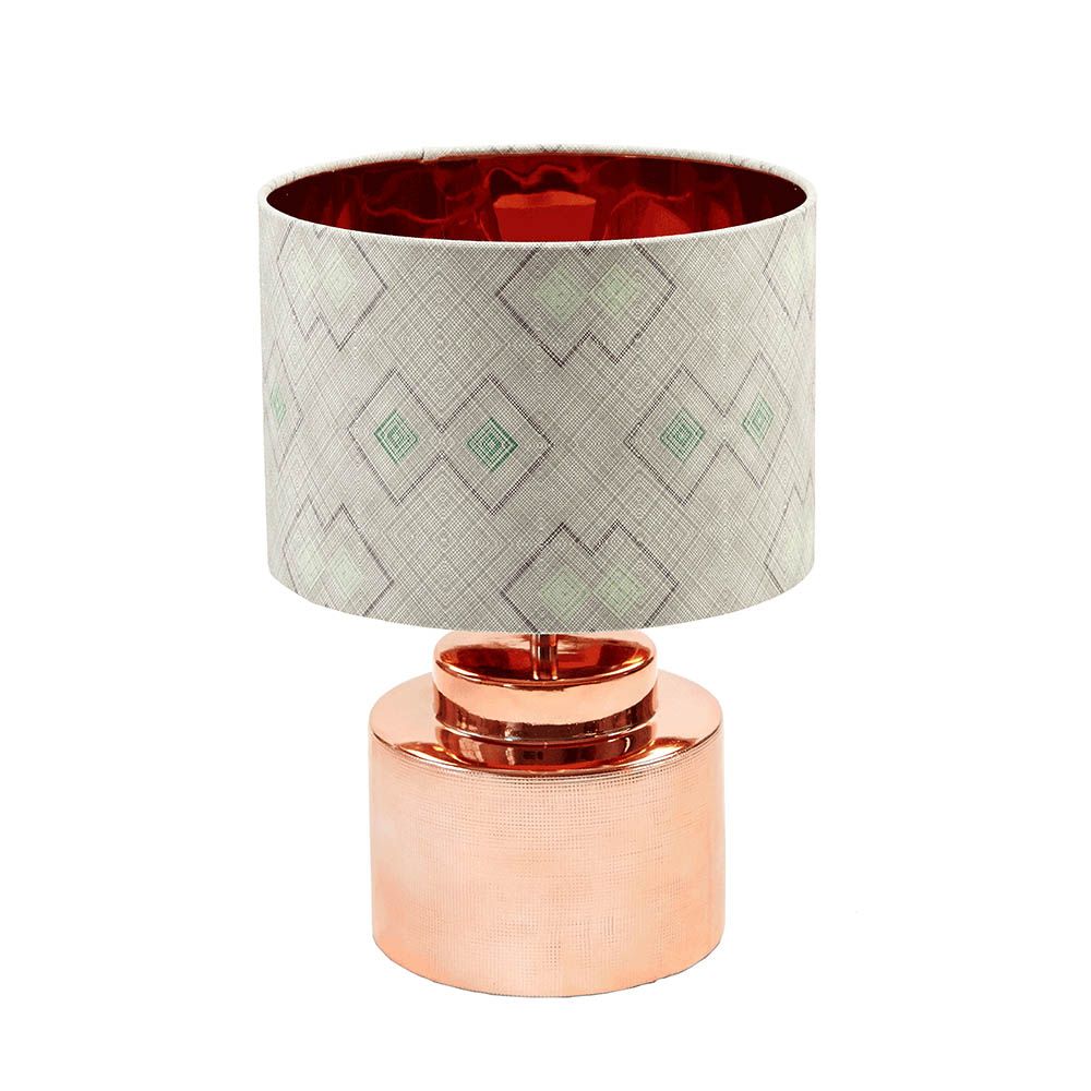 A luxury lampshade by Eva Sonaike with a grey African-inspired pattern