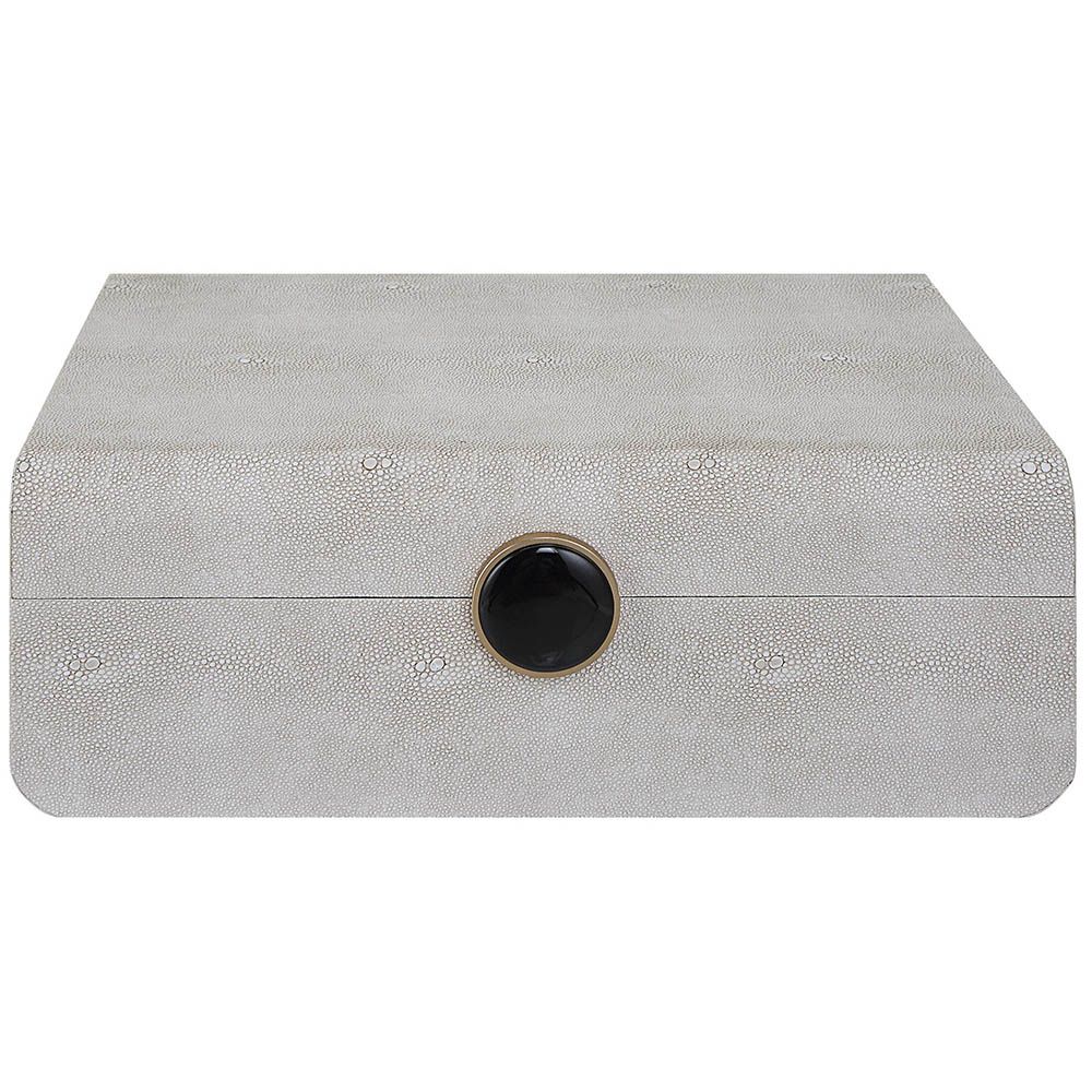 A stylish shagreen box with a white finish and black enamel closure