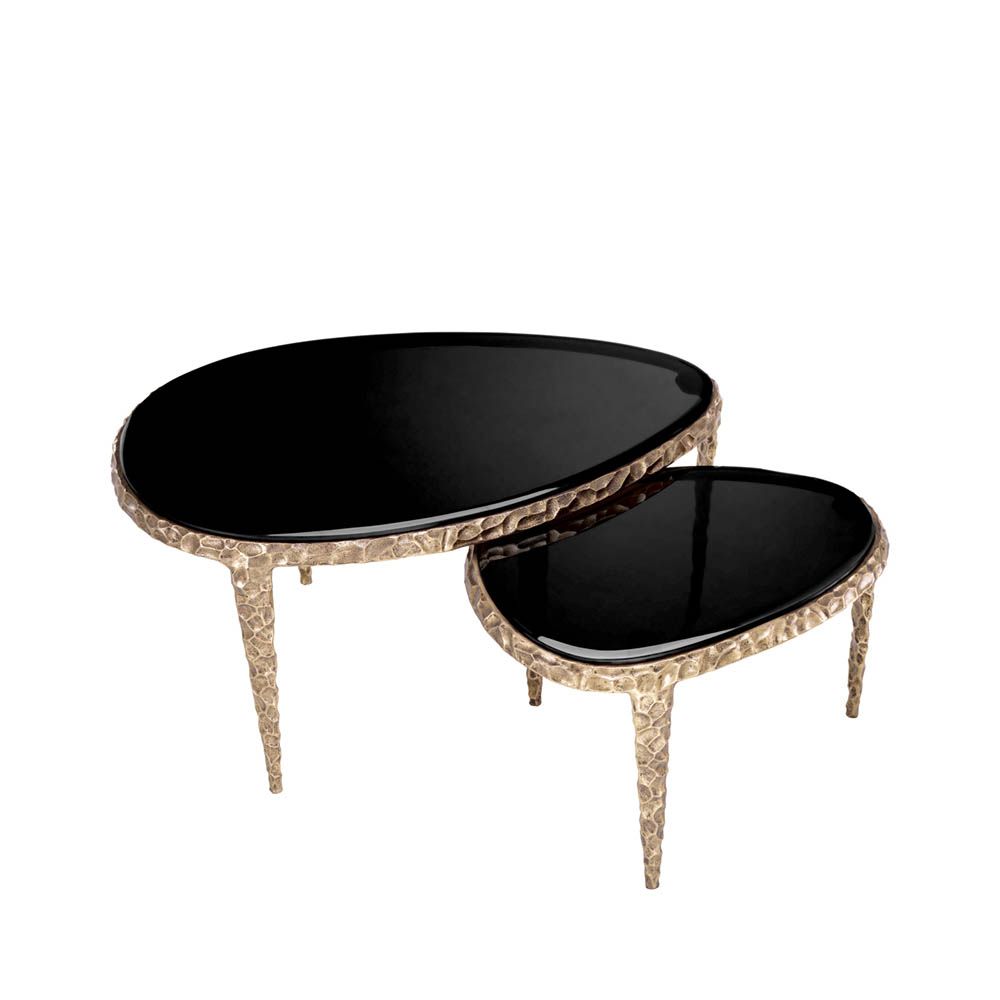 Decadent black top coffee tables with textured brass base